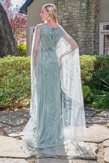 Intricate features stand out across gray Blue mother of the bride dress featuring formal gown with v-neck, straps, lace, mesh skirt.