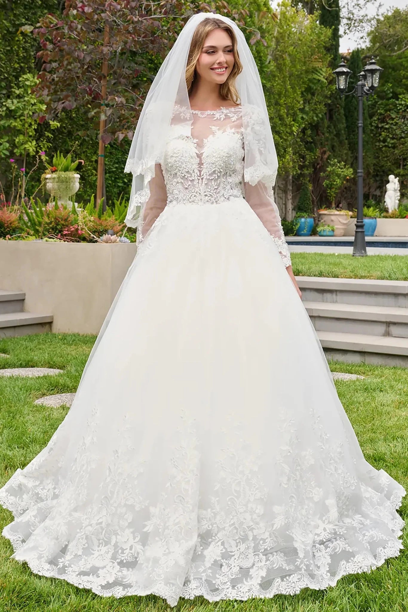 Off-white wedding dress with boat neckline bodice and long sleeves