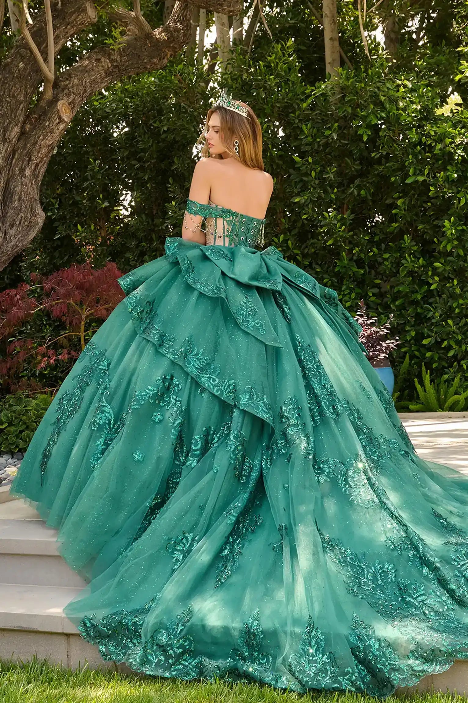 Green quinceañera ball gown with sequins, pearls, jewels and cascading high-low layered overskirt