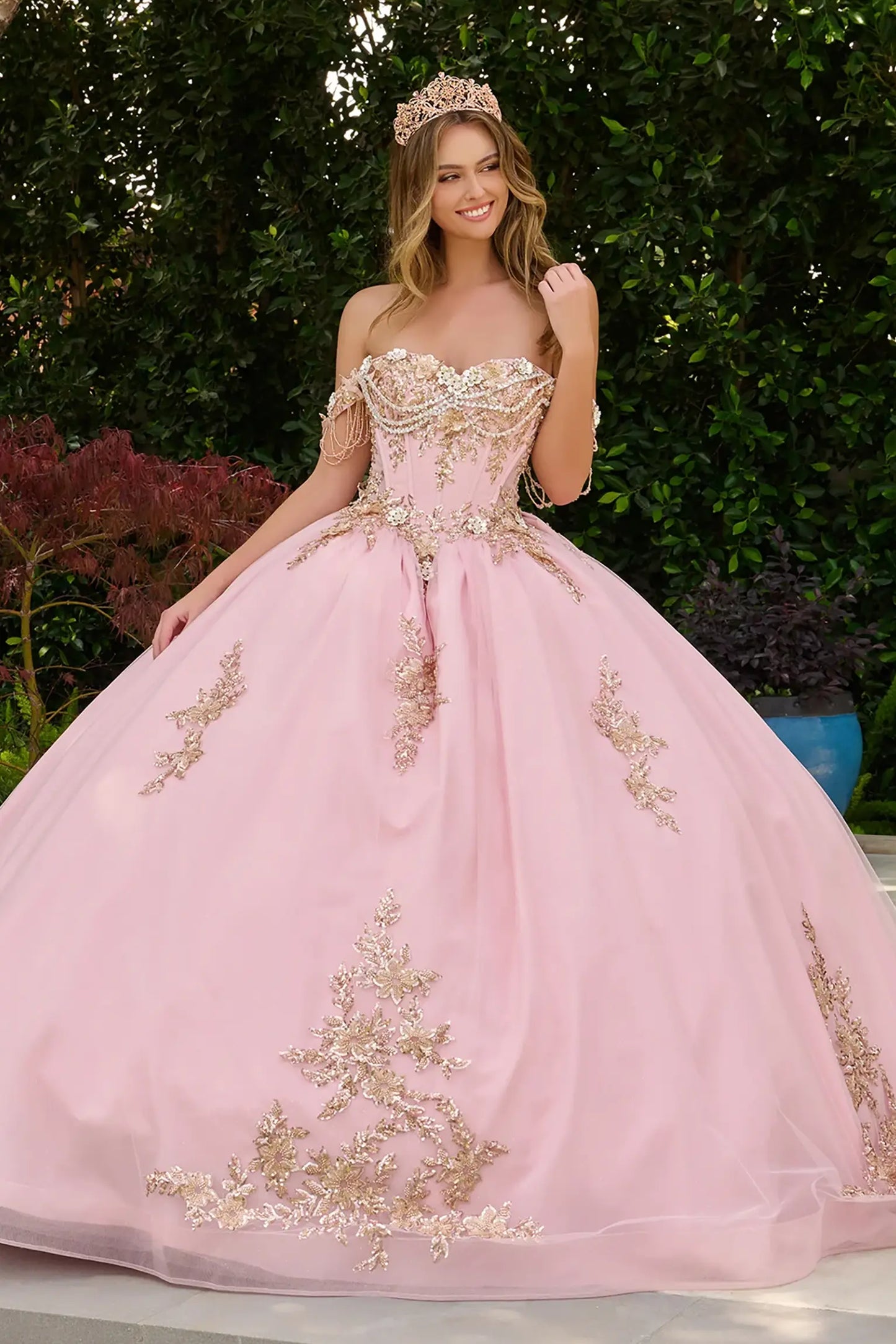Blush quinceañera ball gown with sweetheart corset bodice and detachable off-shoulder straps