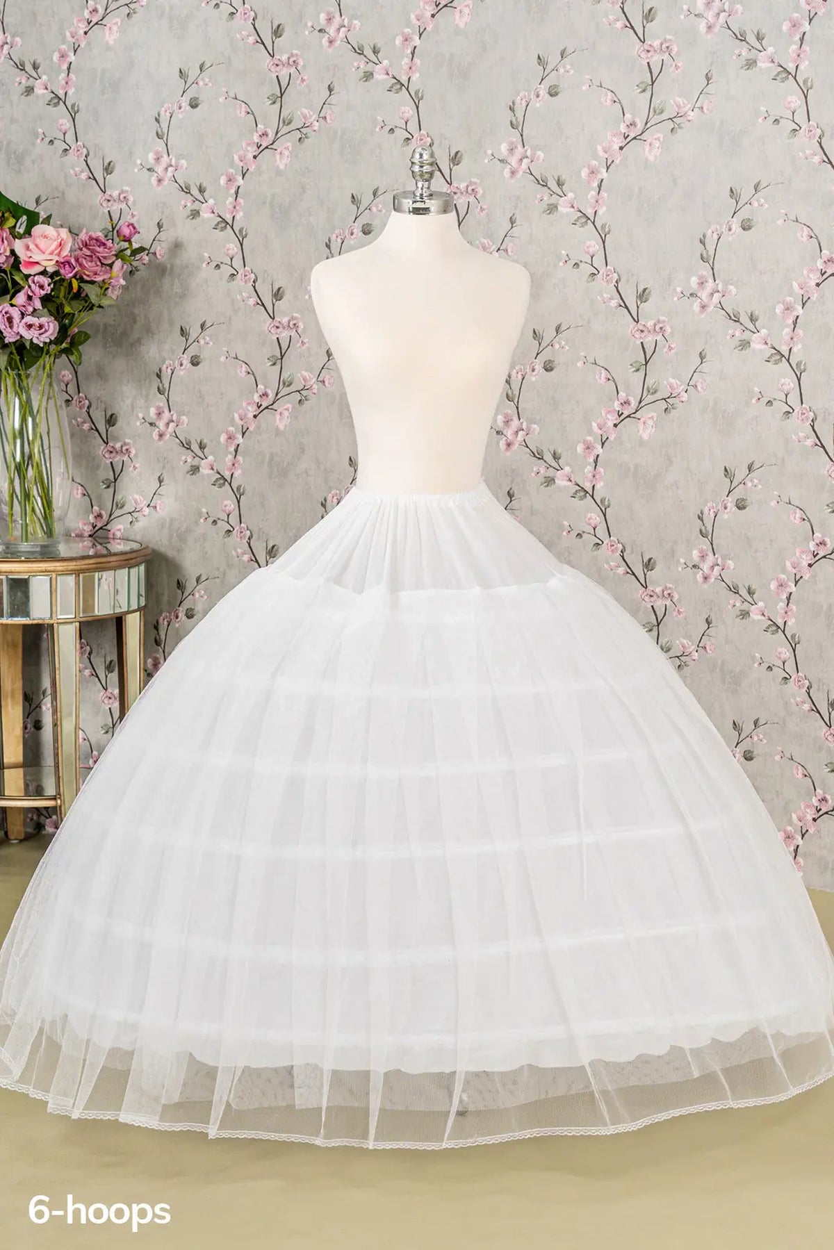 Full view shows White 6-hoop tulle quinceañera petticoat with layered volume.
