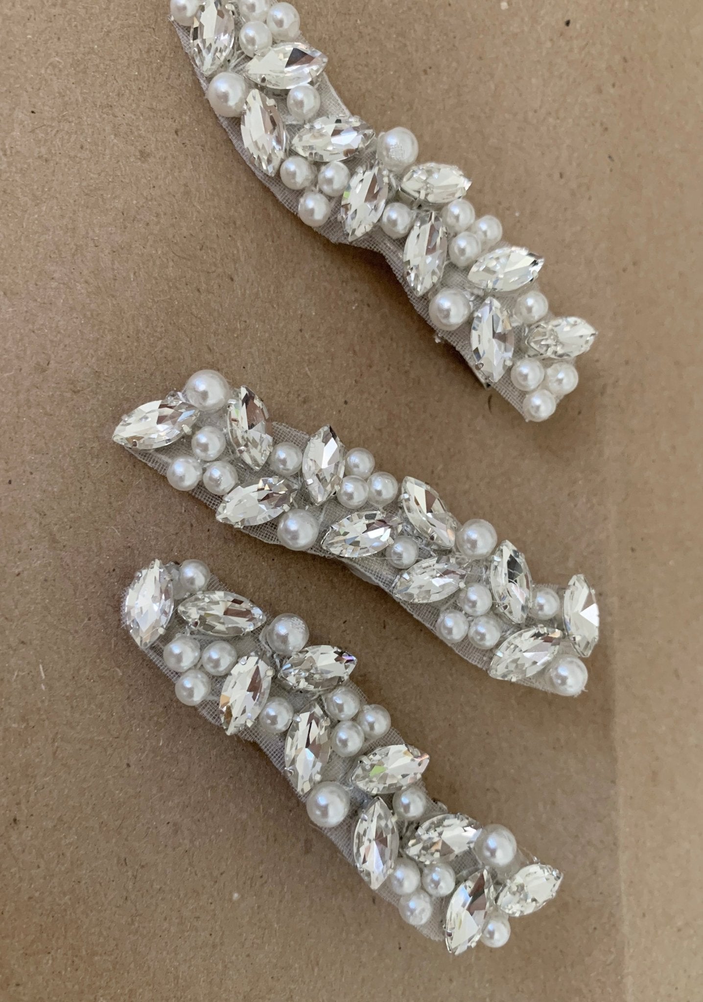Silver pearl rhinestone flower girl hair clip.