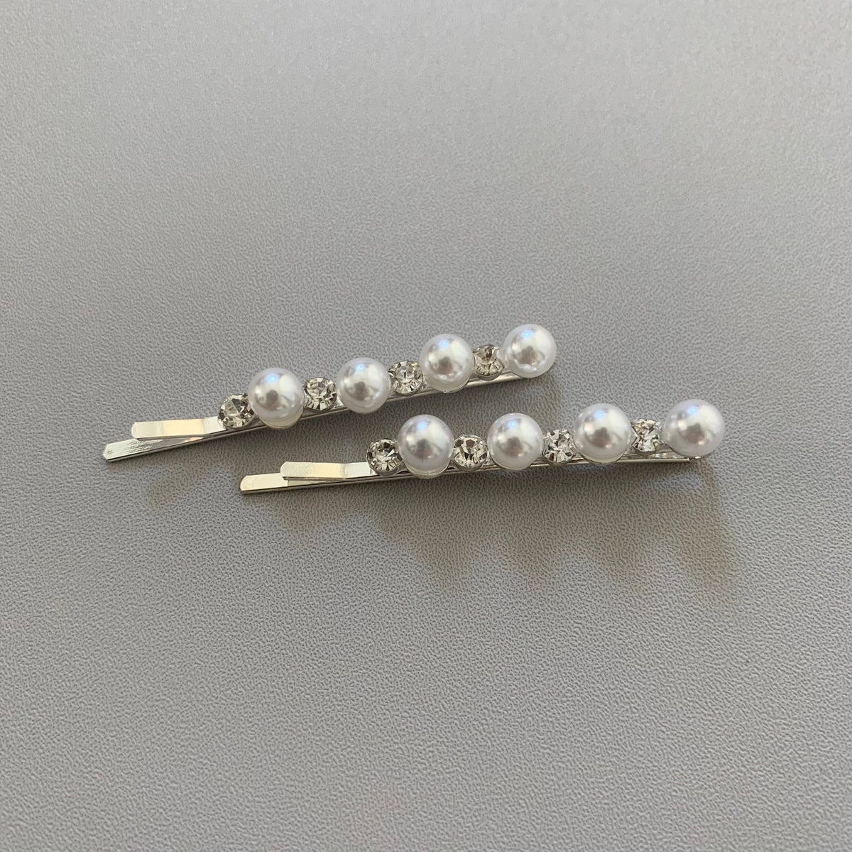 Silver pearl rhinestone flower girl hair pins.