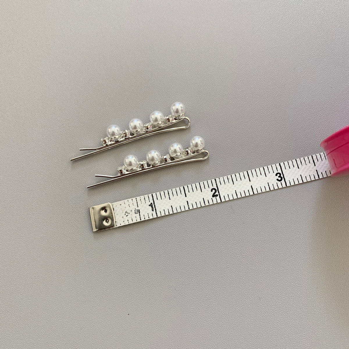 Silver pearl rhinestone flower girl hair pins.