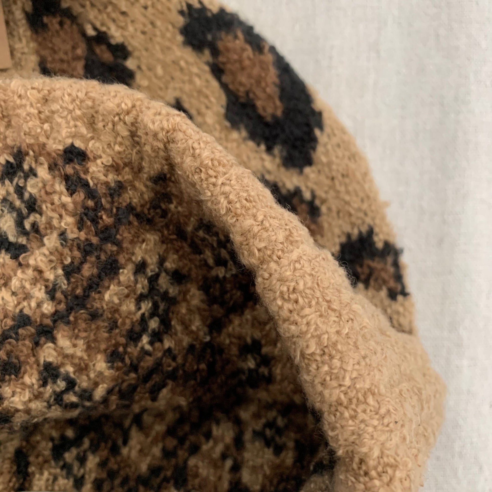 Brown leopard women's winter beanie, interior detail.