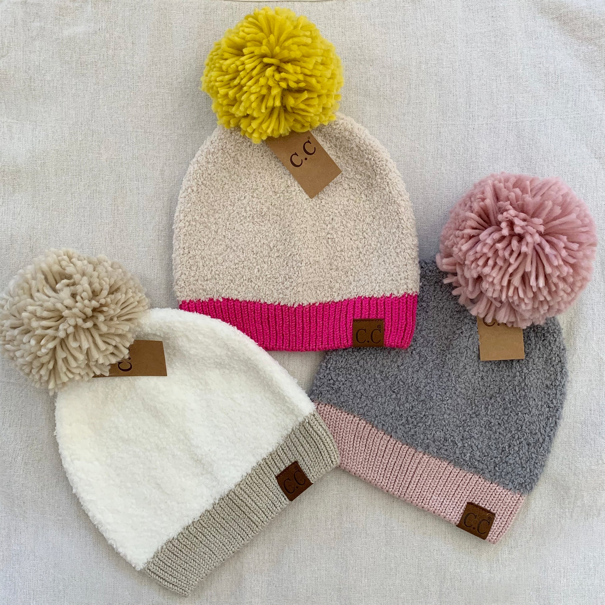 Multi color sherpa pom-pom women's winter beanie, color assortment.