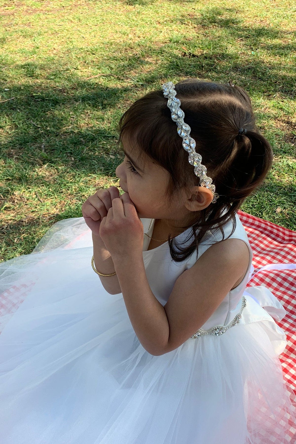Clear rhinestone flower girl headband.
