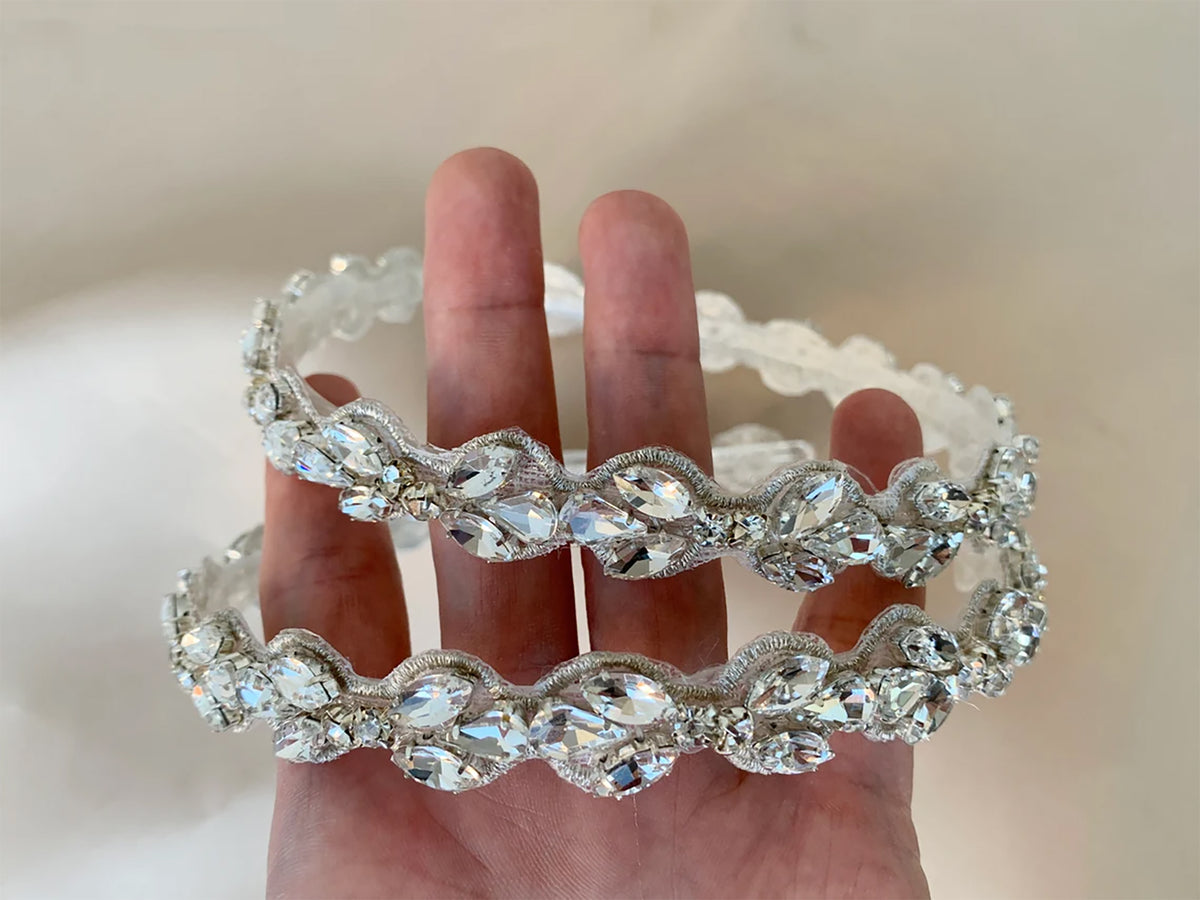 Clear rhinestone flower girl headband.