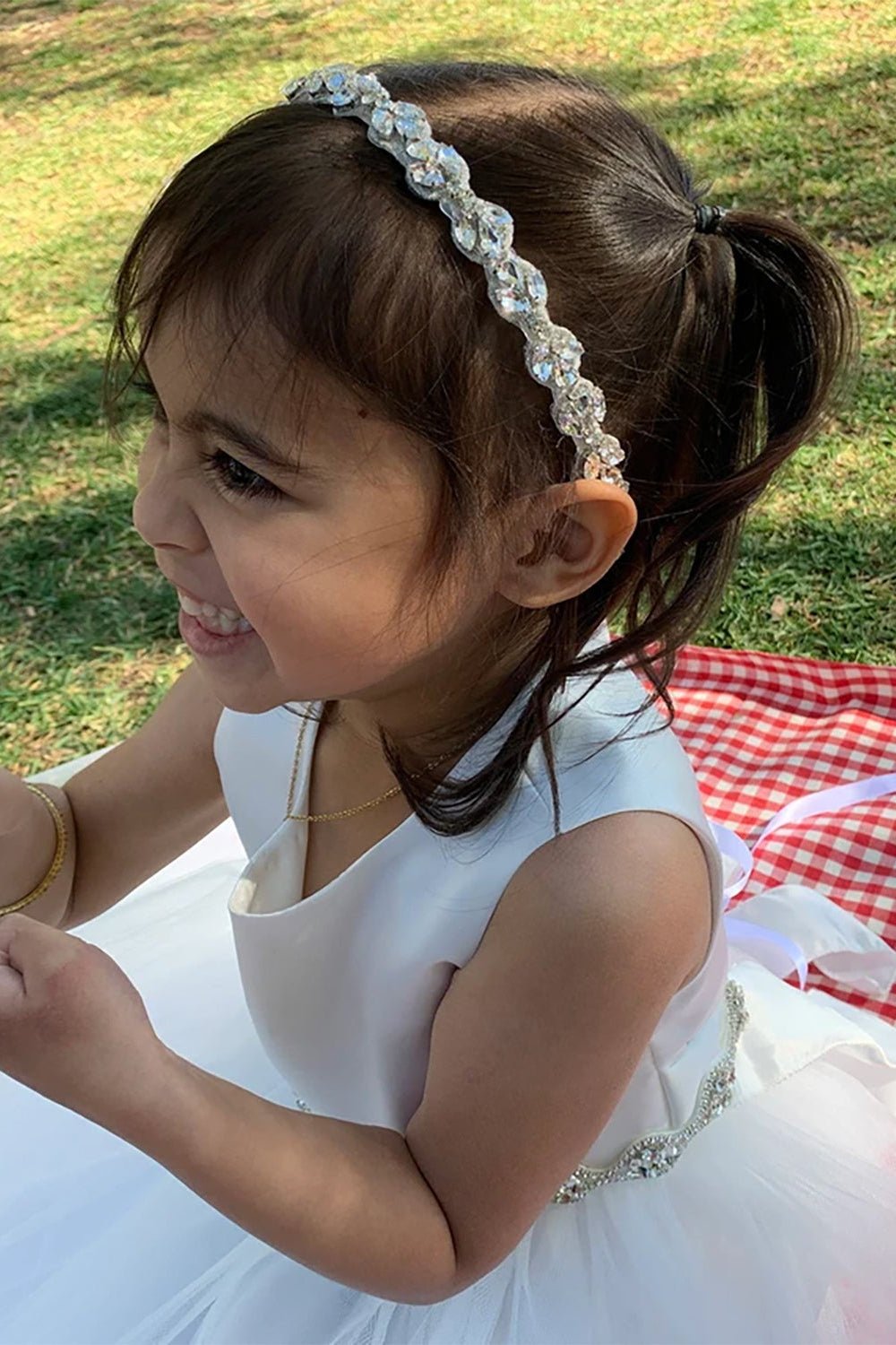 Clear rhinestone flower girl headband.