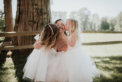 USA Made | Classic Satin and Tulle Flower Girl Dress with detachable Pearl and Satin Sash belt | Size 6M - Teen | Hannah dress girls kissing to bride