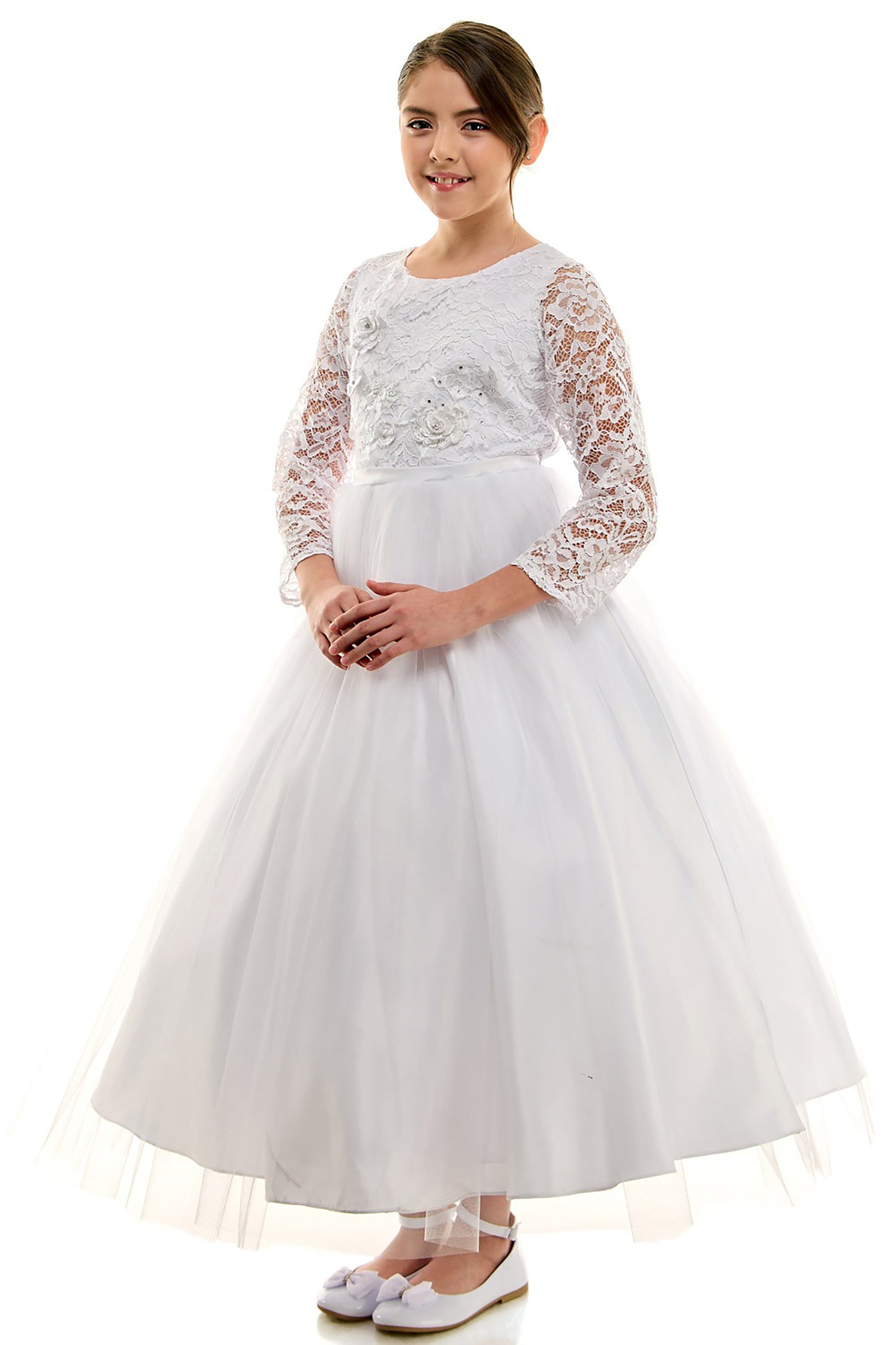 Young girl wearing a white lace dress on a white background