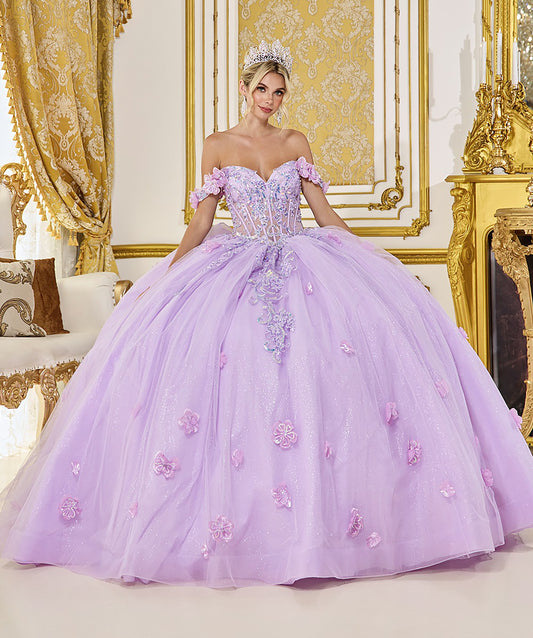Woman in a purple ball gown with floral details in an ornate room.