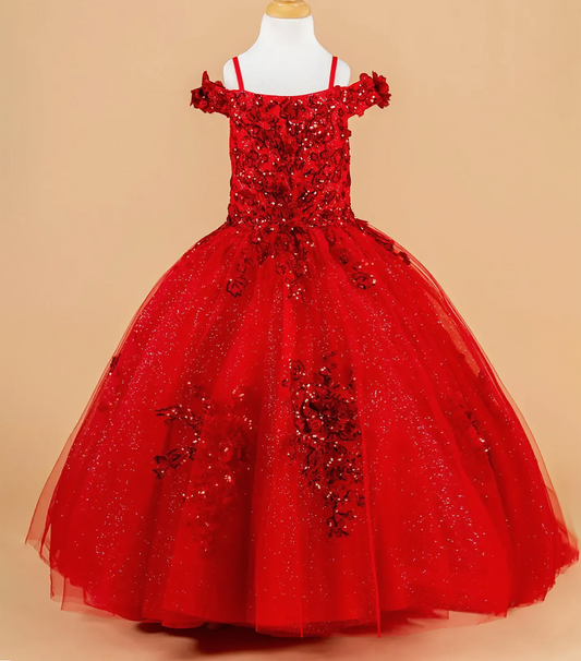 Red ball gown with floral embellishments on a beige background