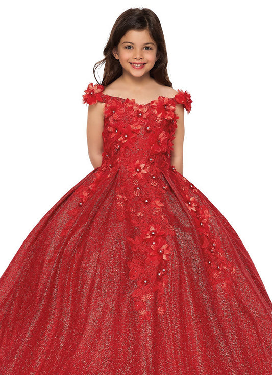 Young girl wearing a red floral dress on a white background