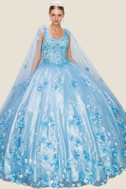 Blue floral gown with a sheer overlay on a beige background