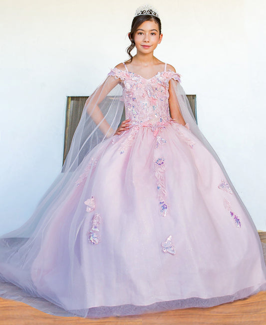 girl in a pink floral dress with a tiara against a plain background