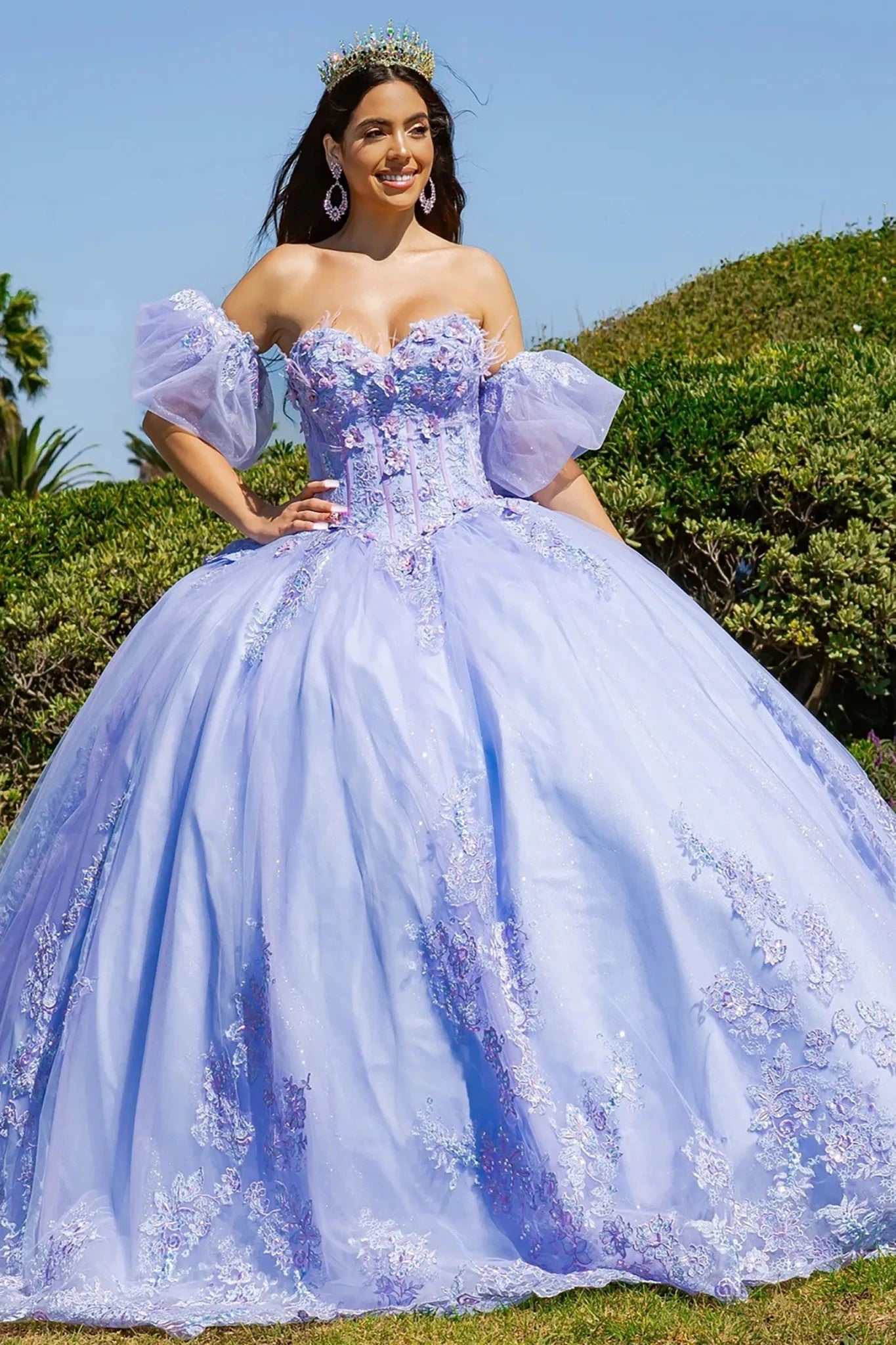 a girl wearing a two tone lilac blue quinceanera dress outdoor and smailing