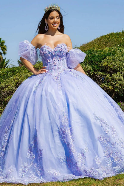 a girl wearing a two tone lilac blue quinceanera dress outdoor and smailing