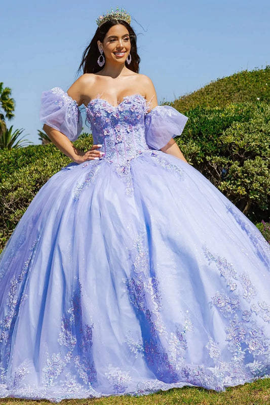 a girl wearing a two tone lilac blue quinceanera dress outdoor and smailing