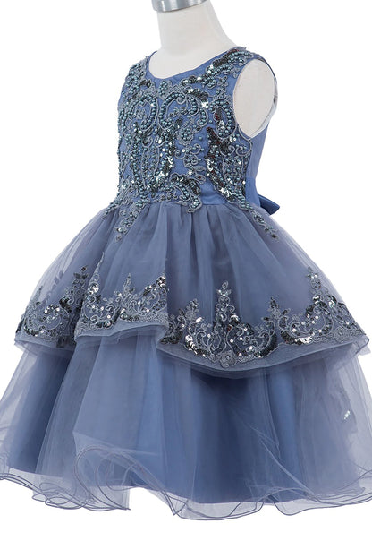 Blue dress with sequin embellishments on a mannequin against a white background