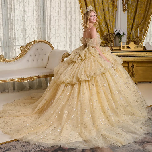 Woman in a luxurious beige gown with a tiara in an opulent room.
