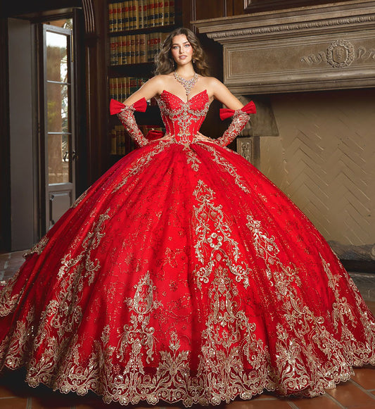 Red ball gown with gold embroidery in a room with wooden paneling and books.