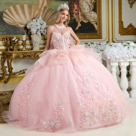 Young girl in a pink ball gown with sequins in an ornate room.