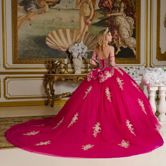 Quinceañera | Fuchsia Ball Gown with Sheer Sweetheart Bodice, Glitter Skirt, and Detachable Bow | Laurencia dress back view