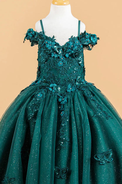 Green evening gown with floral and butterfly details on a beige background