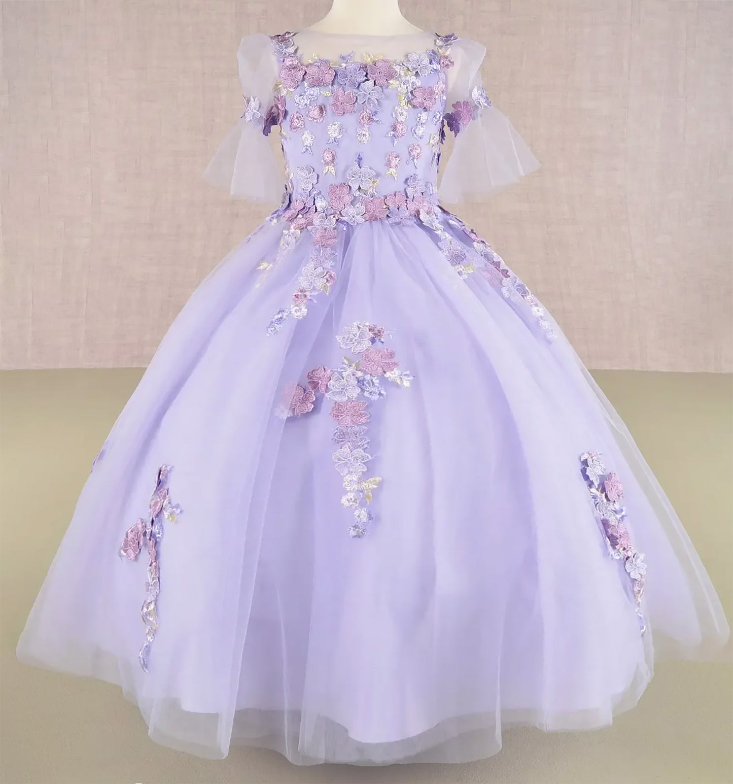 Lilac Kid Ballgown with 3D Floral Appliqué, Puff Sleeves, and Long Back Hem front view
