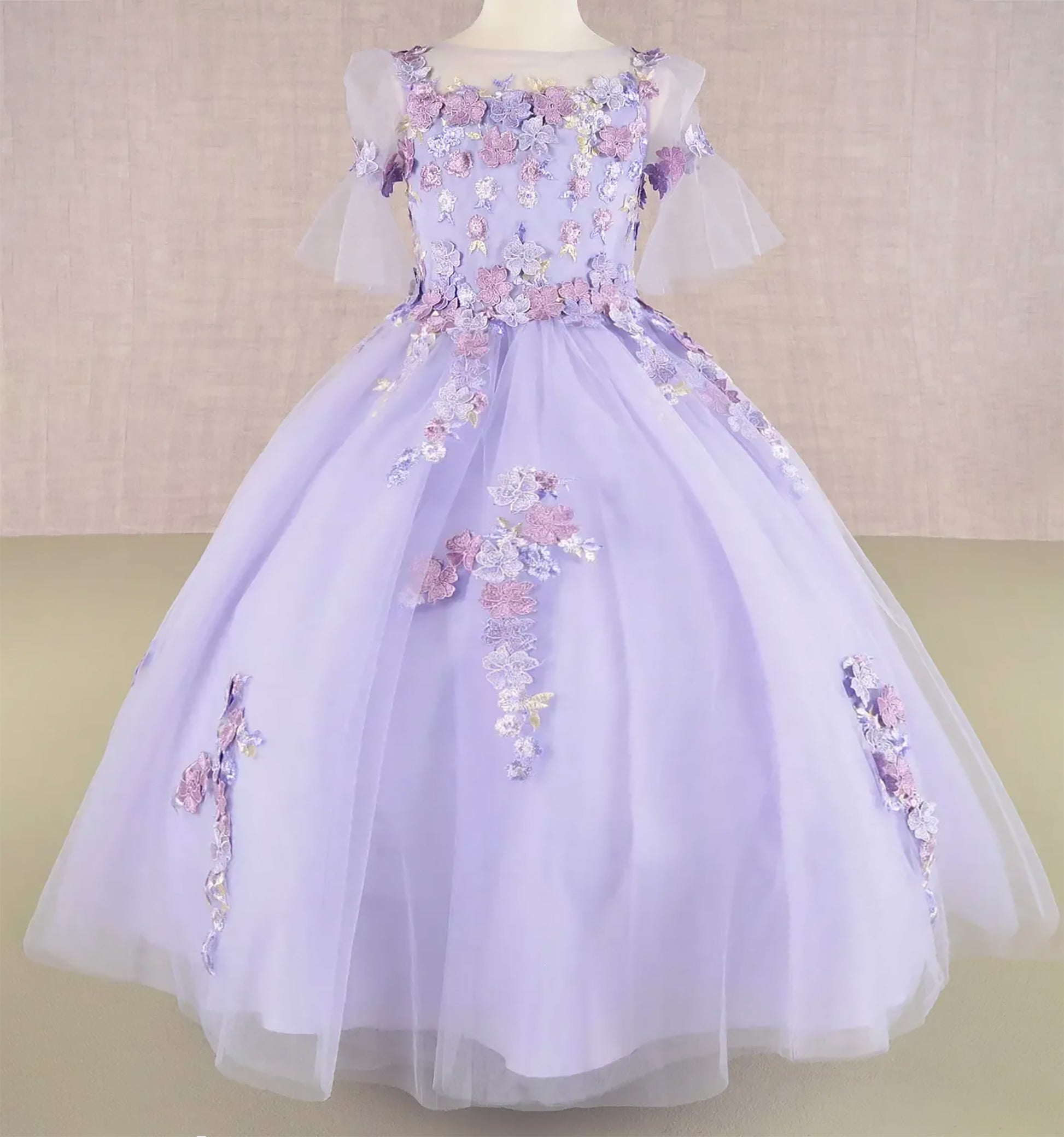 Lilac Kid Ballgown with 3D Floral Appliqué, Puff Sleeves, and Long Back Hem front view