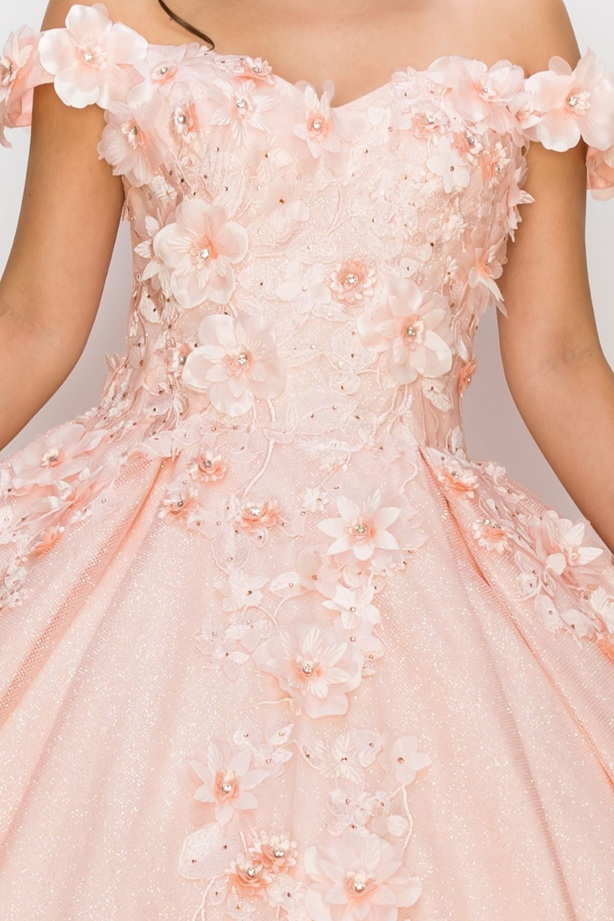 Close-up of a pink floral dress with a plain background