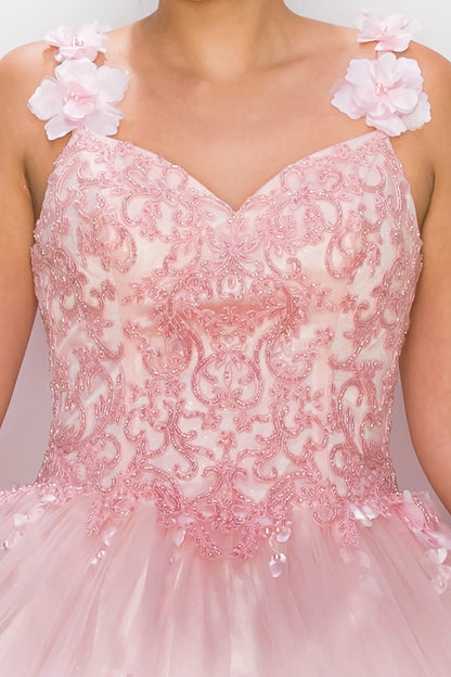 Pink lace dress with floral straps on a plain background