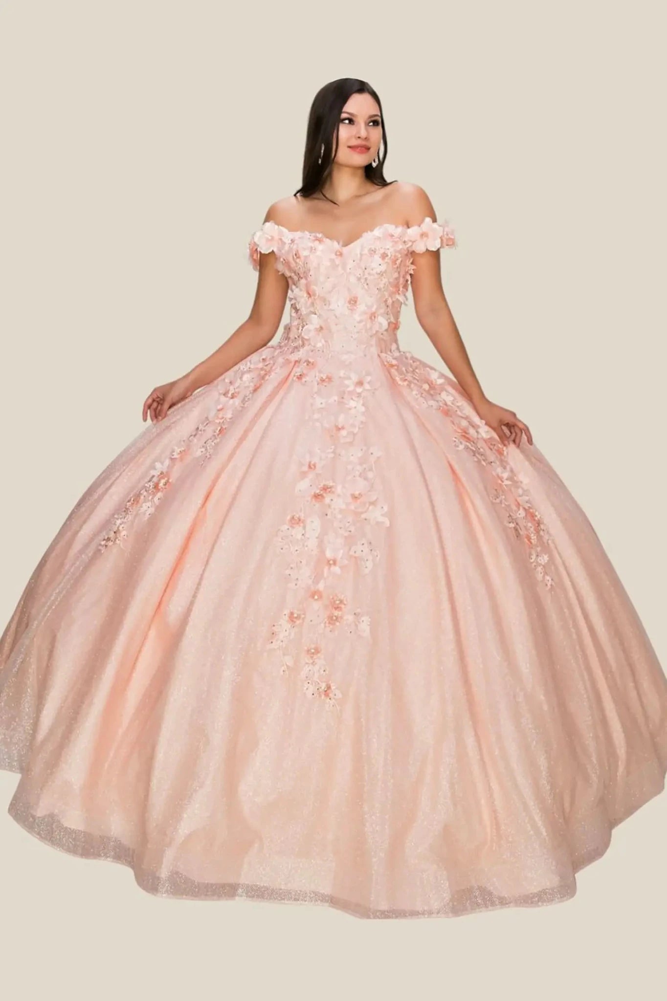 Woman wearing a pink floral off-shoulder gown on a beige background
