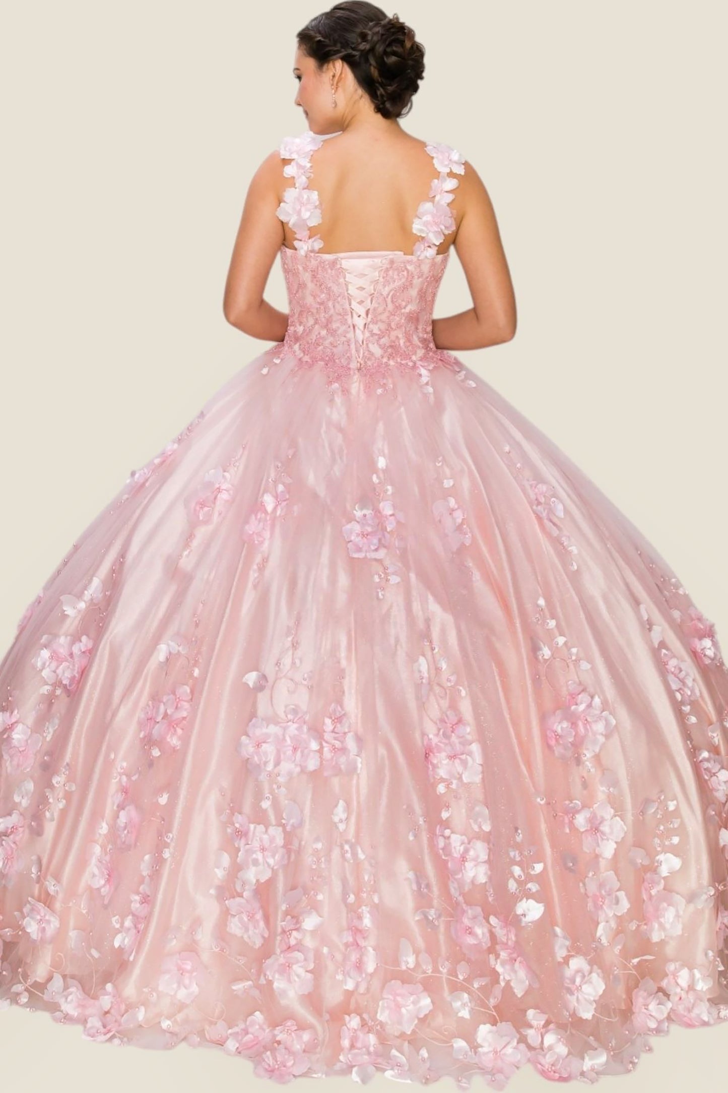 Pink floral gown on a plain background