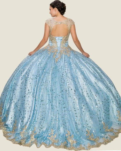 Blue and gold quinceanera dress with intricate detailing on a beige background
