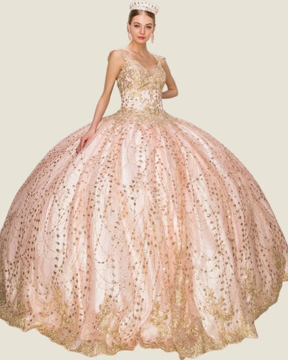 Elegant ball gown with intricate detailing on a plain background