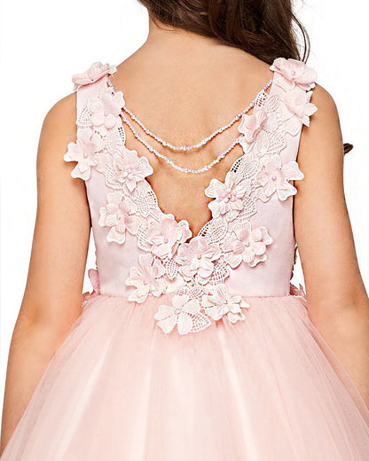 Pink floral dress with a detailed back design on a white background