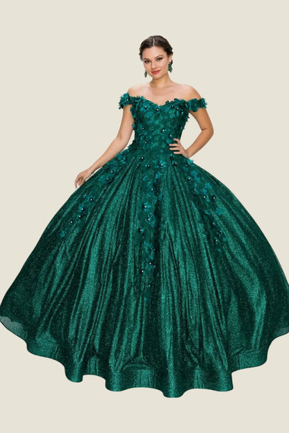 Woman wearing a green off-shoulder gown with floral embellishments on a beige background