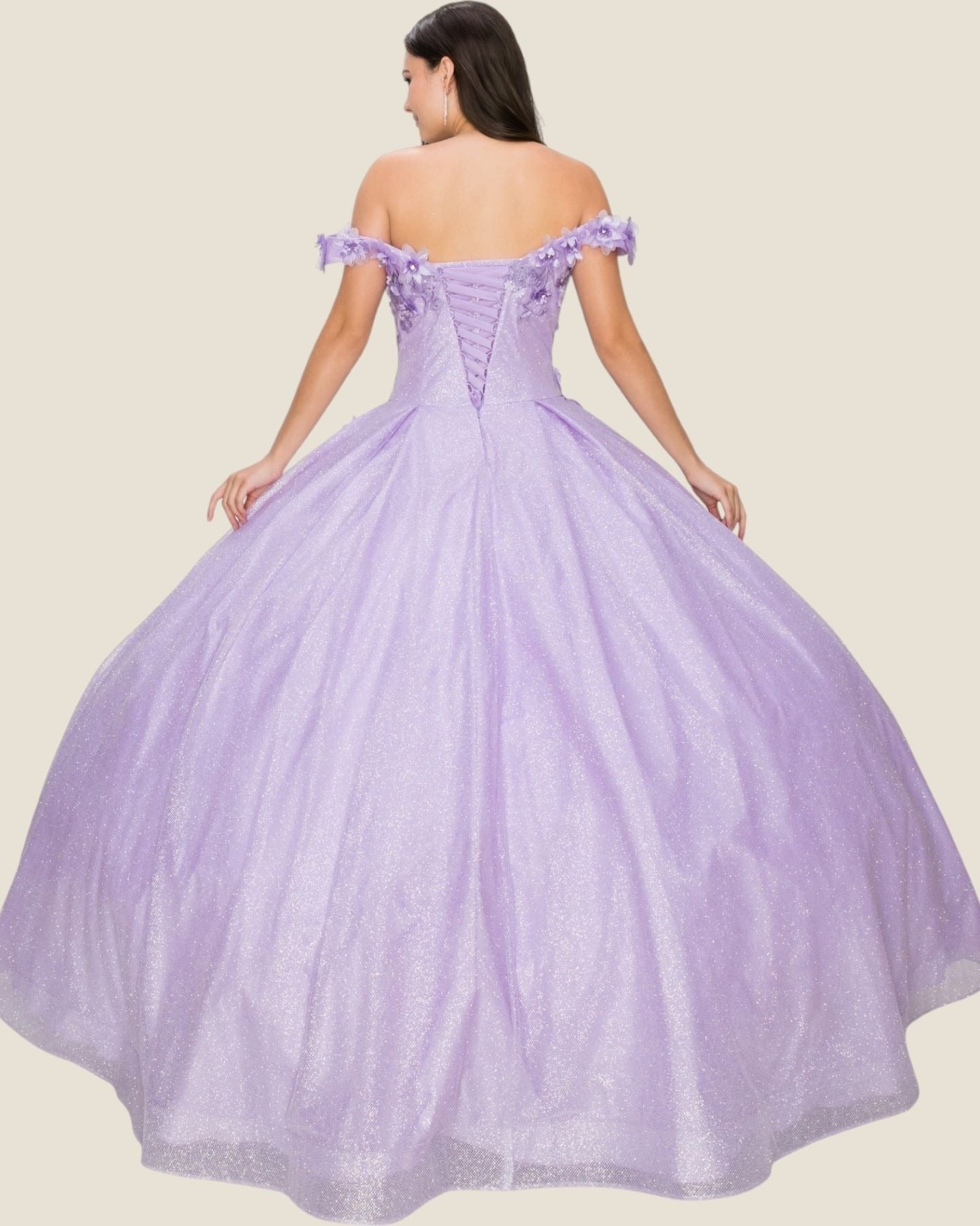 Lavender off-shoulder gown on a plain background