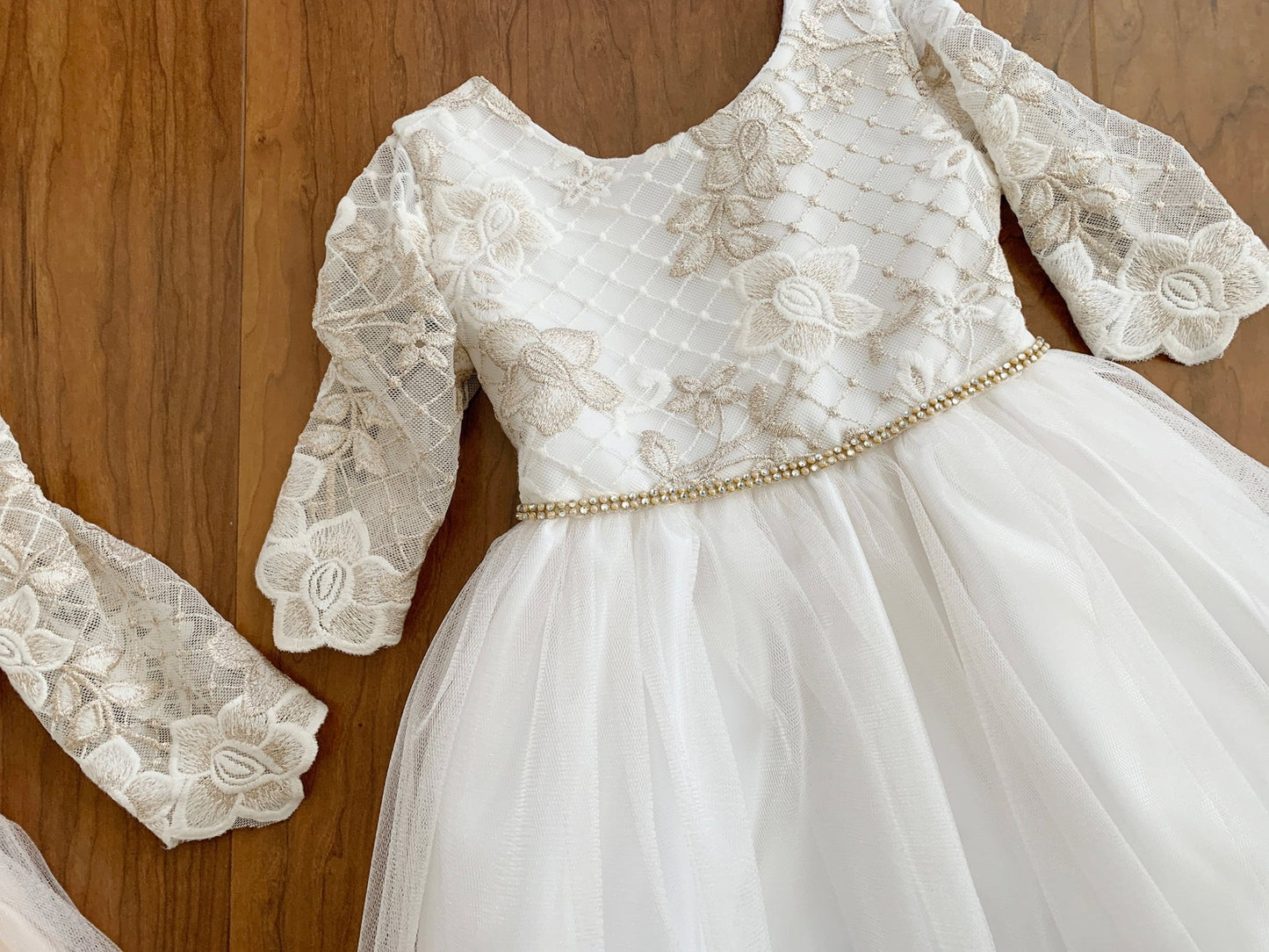 Long sleeve Off-white floral lace dress with a gold rhinestone belt