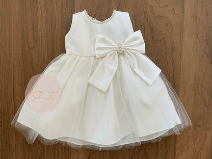 Ivory USA Made | Pearl Neckline & Pearl detail Bow Satin and Tulle Flower Girl Dress - front view of dress with beautiful bow