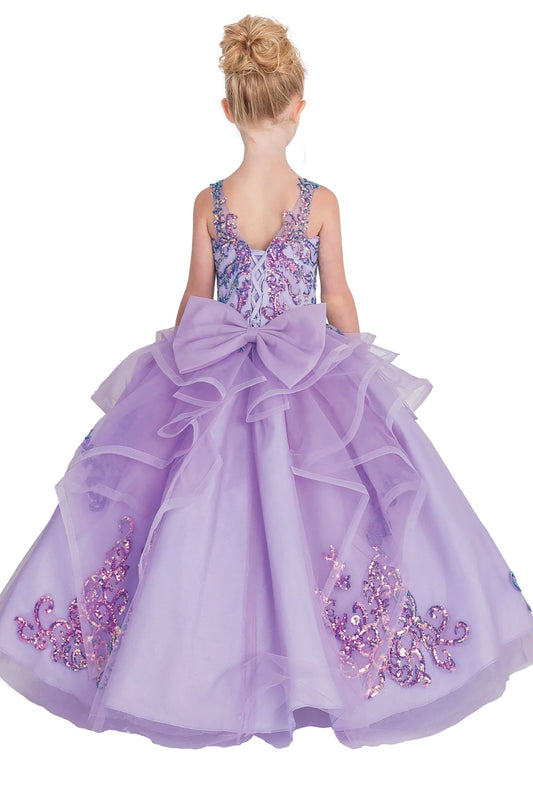 Lilac kids mini quinceañera mini quince dress with sequin bodice, oversized bow and tulle overlay skirt.