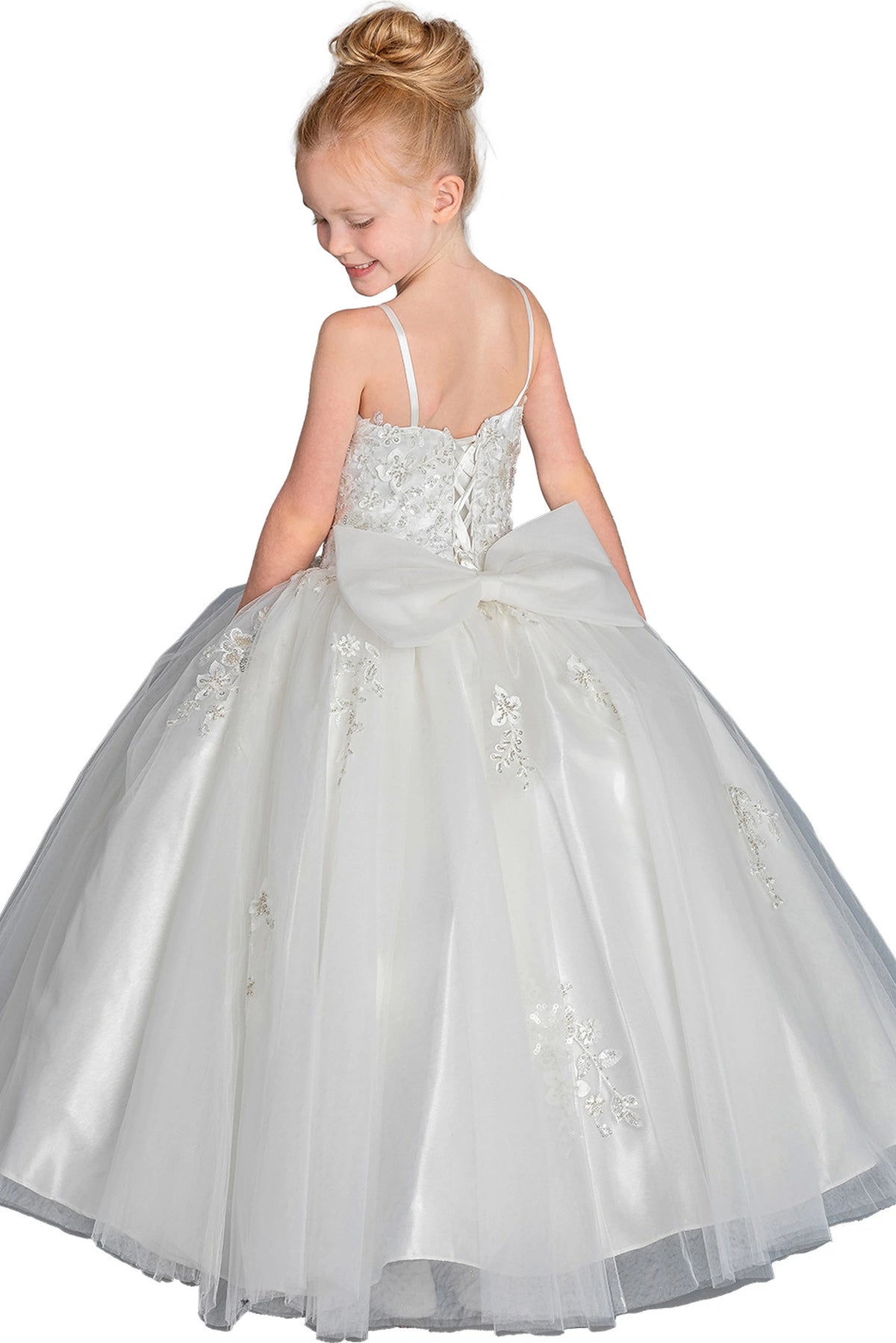 At the back, the White mini quinceañera dress features satin bow accenting the lace-up back.