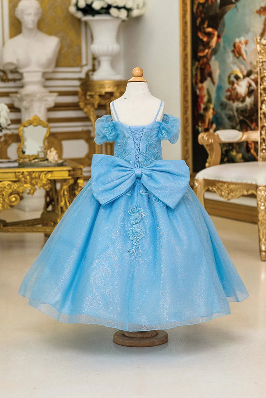Finished with a large bow, the Bahama Blue mini quinceañera ball gown shows its lace-up back.