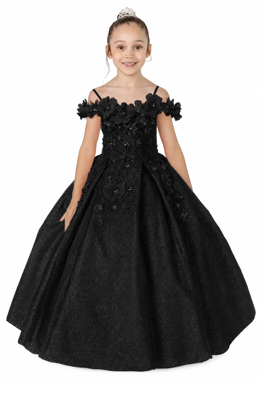 Young girl in black kids mini quinceañera dress with floral shoulder appliqués and glitter tulle layered skirt