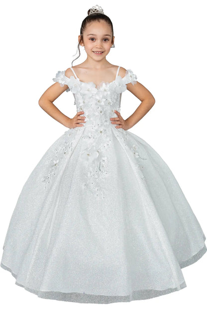 Young girl standing front-facing in white kids mini quinceañera dress with floral shoulder appliqués and glitter tulle layered skirt