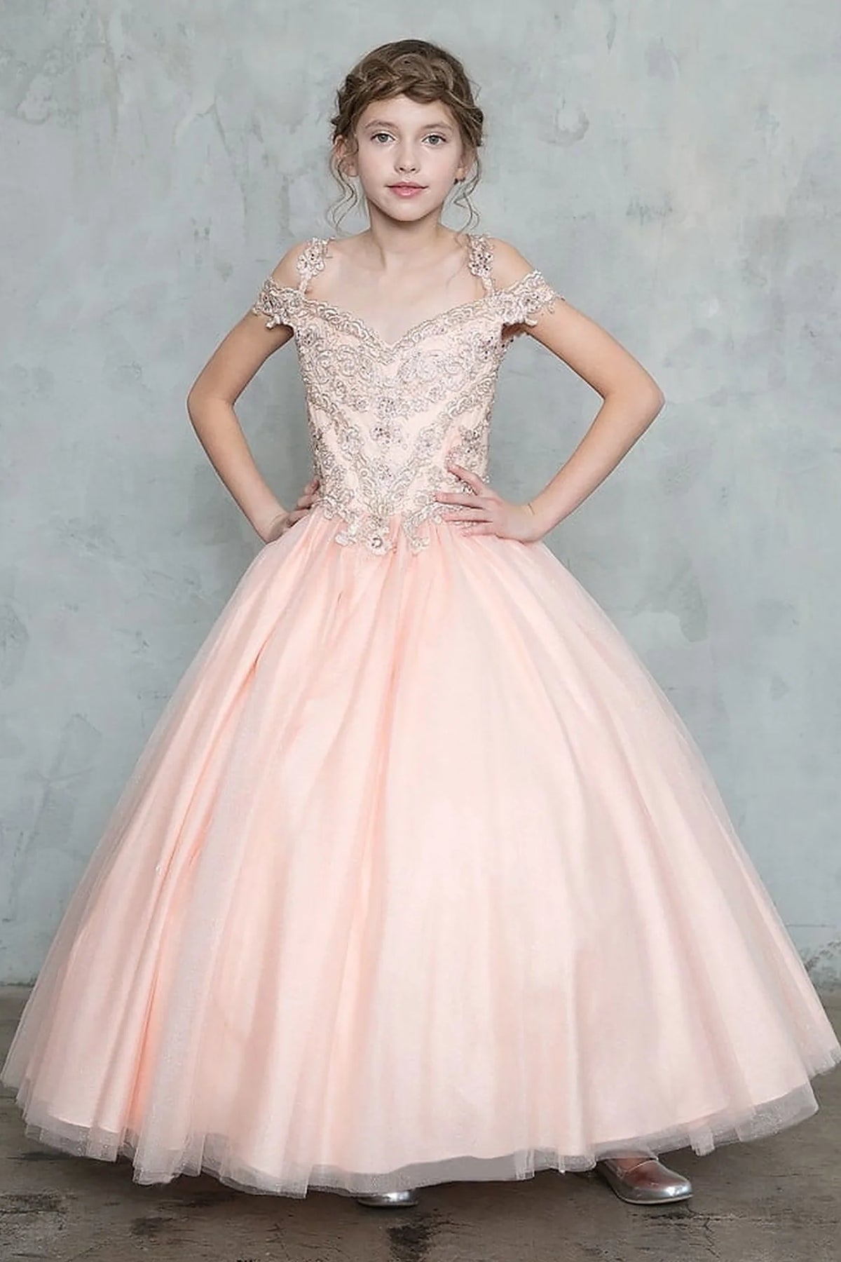 At the bodice and skirt, the Blush mini quince dress showcases sparkling embroidered off-the-shoulder bodice and shimmering full tulle ball gown skirt.