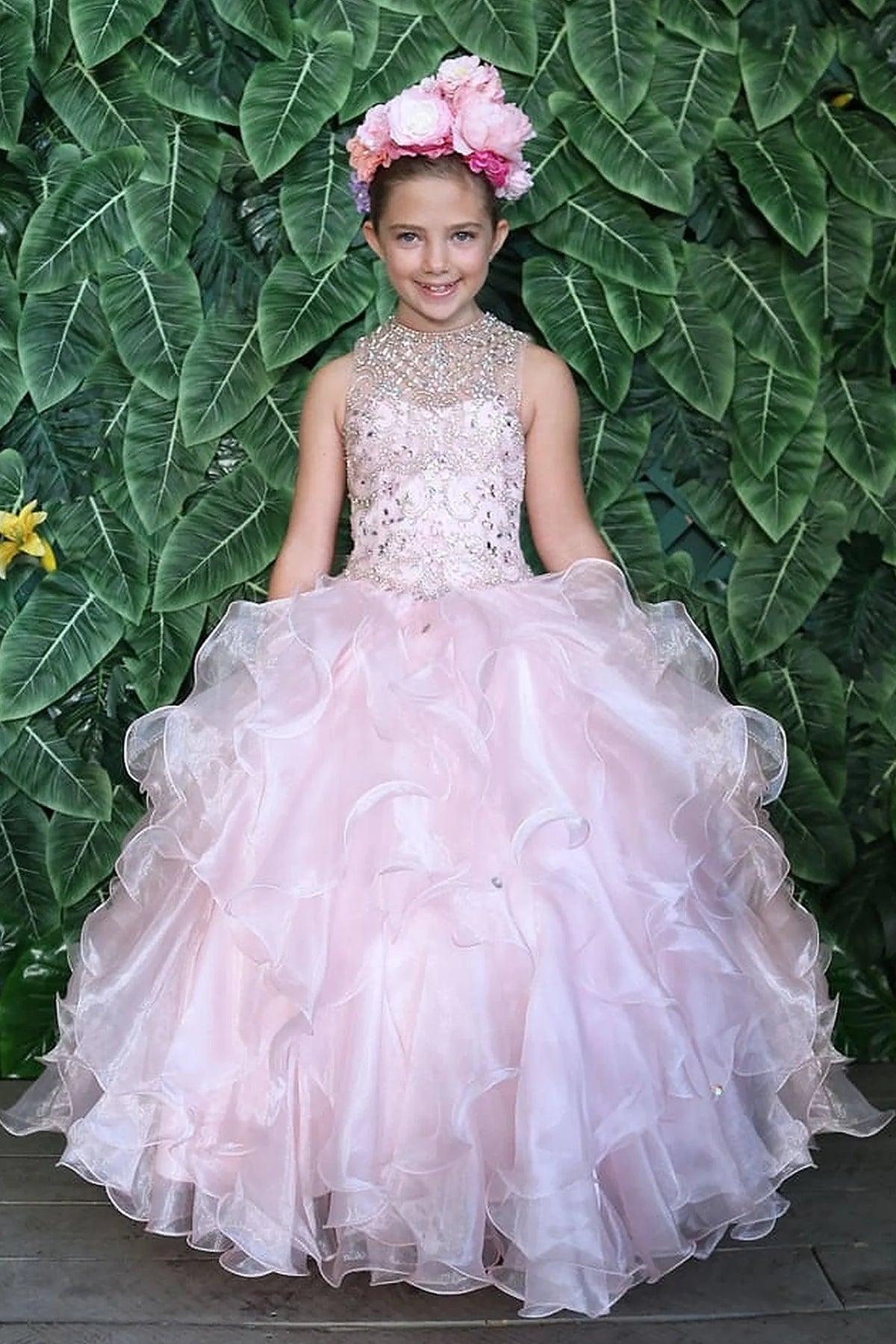 From the neckline down, the Blush mini quince dress showcases sparkling stone-embellished bodice and playful tiered organza ruffle skirt.