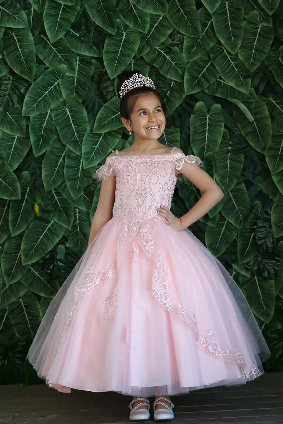 A closer look shows, the Blush mini quince dress showcases off-the-shoulder embroidered bodice and delicately embroidered tulle skirt.